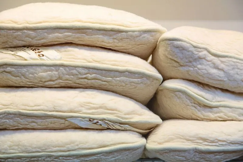 Kopfkissen und Oberbetten regelmäßig waschen