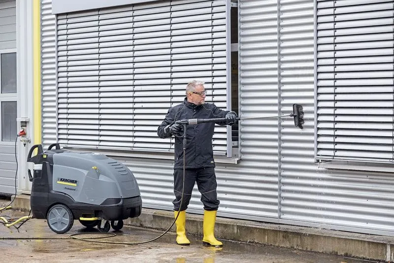 Wasserdichte Nässeschutzkleidung und Sicherheitsstiefel